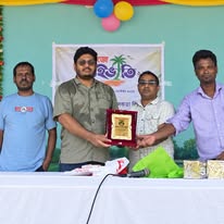 Receiving Crest of Appreciation from Department Chairman Dr. Belal Hossain at Comilla University.